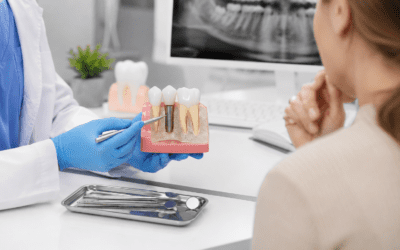 Dental consultation with implant model demonstration